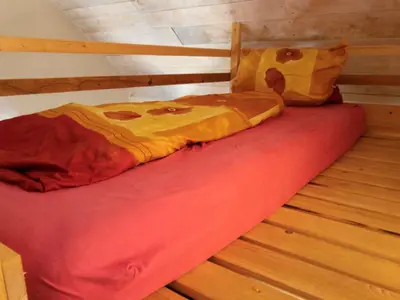 Ein Bett oder Betten in einem Zimmer der Unterkunft Bauernhof Lisa Offenstall und Taubenschlag