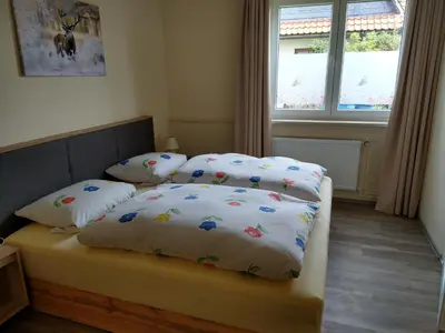 Ein Bett oder Betten in einem Zimmer der Unterkunft Haus Waldblick