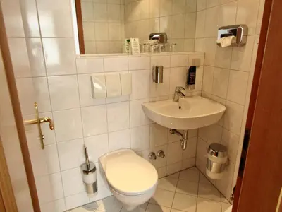 Ein Badezimmer in der Unterkunft Pension Hexenkessel