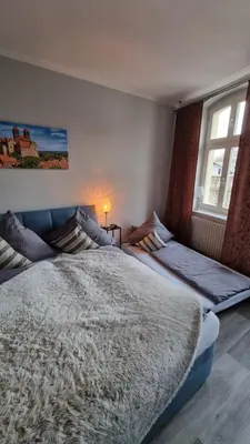 Ein Bett oder Betten in einem Zimmer der Unterkunft Fewo Otto