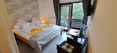 Ein Bett oder Betten in einem Zimmer der Unterkunft Quellenhof Altenau