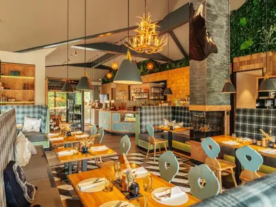 Ein Restaurant oder anderes Speiselokal in der Unterkunft Ferienhaus in Schierke mit Garten