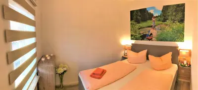 Ein Bett oder Betten in einem Zimmer der Unterkunft Ferienhaus Burgfried