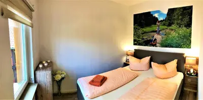 Ein Bett oder Betten in einem Zimmer der Unterkunft Ferienhaus Burgfried