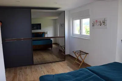 Ein Bett oder Betten in einem Zimmer der Unterkunft Harzhaus Sonnenschein