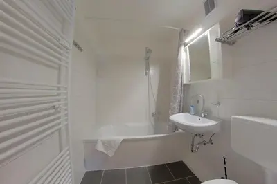 Ein Badezimmer in der Unterkunft Apartment 560