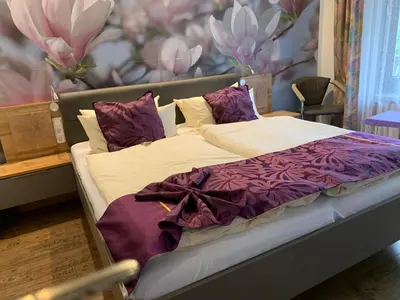 Ein Bett oder Betten in einem Zimmer der Unterkunft Hotel Paidion