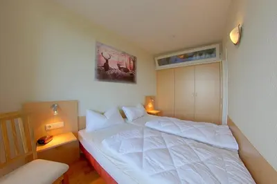 Ein Bett oder Betten in einem Zimmer der Unterkunft Apartment 535