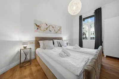 Ein Bett oder Betten in einem Zimmer der Unterkunft EUPHORAS - Central & Stylish Apartment - Parking