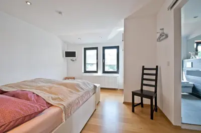 Ein Bett oder Betten in einem Zimmer der Unterkunft Schönblick