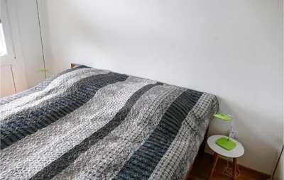 Ein Bett oder Betten in einem Zimmer der Unterkunft Pet Friendly Apartment