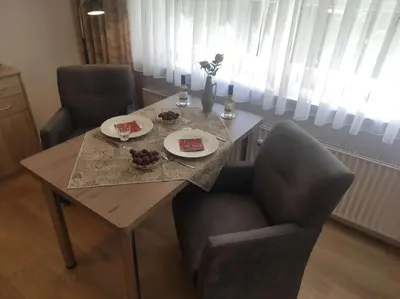 Ein Sitzbereich in der Unterkunft Ferienwohnung Magdalena