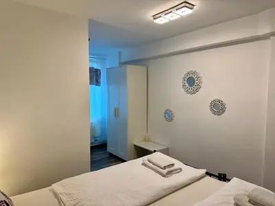 Ein Bett oder Betten in einem Zimmer der Unterkunft Kleine-Romantische Ferienwohnung Parkplatz vor dem Haus!