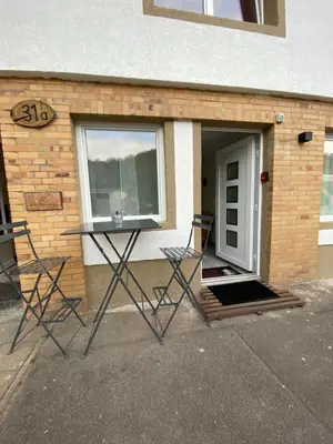 Ein Patio oder anderer Außenbereich in der Unterkunft Kleine-Romantische Ferienwohnung Parkplatz vor dem Haus!