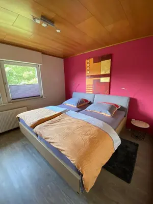 Ein Bett oder Betten in einem Zimmer der Unterkunft Brockenblick