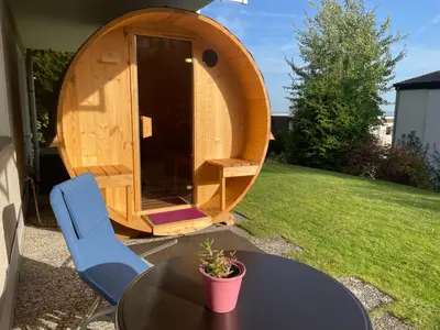 Ein Garten an der Unterkunft Ferienwohnung Elfengast, FassSauna, Harzurlaub in bester Lage