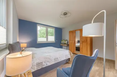 Ein Bett oder Betten in einem Zimmer der Unterkunft Im Mühlental