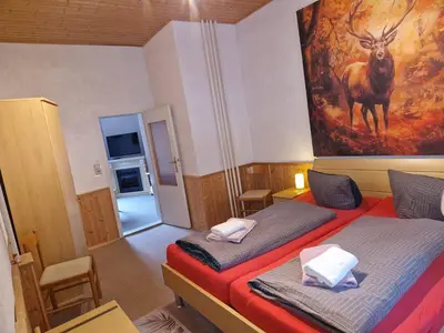 Ein Bett oder Betten in einem Zimmer der Unterkunft Haus Fessel - Birkenkopf