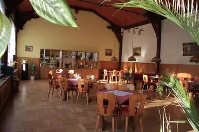Ein Restaurant oder anderes Speiselokal in der Unterkunft Pension Villa Kassandra