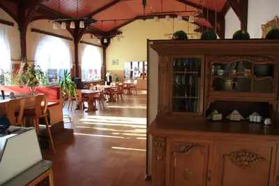 Ein Restaurant oder anderes Speiselokal in der Unterkunft Pension Villa Kassandra