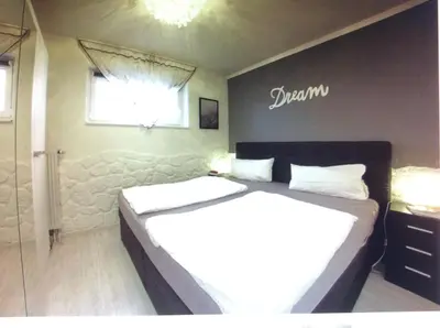 Ein Bett oder Betten in einem Zimmer der Unterkunft Ferienwohnung App 256