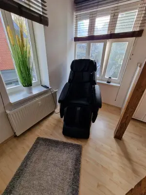 Ein Sitzbereich in der Unterkunft FeWo gemütliche Residenz mit Holzofen-Sauna von Harztraveler