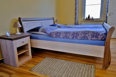 Ein Bett oder Betten in einem Zimmer der Unterkunft An den Weiden