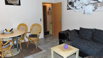 Ein Sitzbereich in der Unterkunft Ferienwohnung Bauer