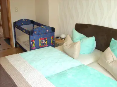 Ein Bett oder Betten in einem Zimmer der Unterkunft Ferienwohnung Bauer
