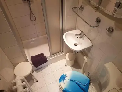Ein Badezimmer in der Unterkunft Bungalow Weidling