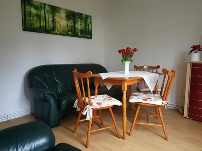 Ein Sitzbereich in der Unterkunft Bungalow Weidling