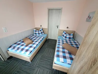 Ein Bett oder Betten in einem Zimmer der Unterkunft Ferienhaus Harztraum