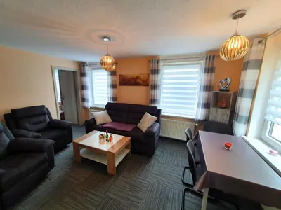 Ein Sitzbereich in der Unterkunft Ferienhaus Harztraum