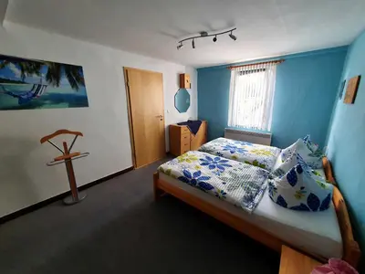 Ein Bett oder Betten in einem Zimmer der Unterkunft Ferienhaus Gundel Hohmann