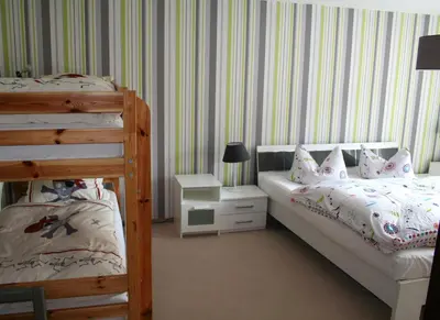 Ein Bett oder Betten in einem Zimmer der Unterkunft Ferienhaus Familie Knoll