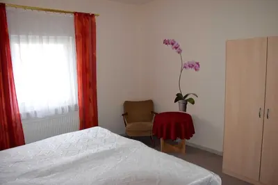 Ein Bett oder Betten in einem Zimmer der Unterkunft Ferienwohnung 