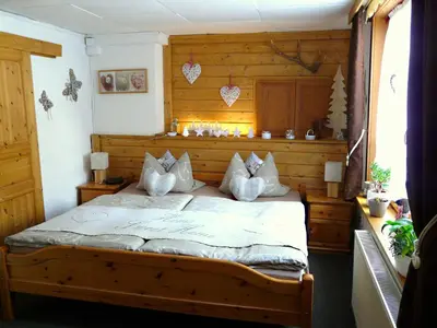 Ein Bett oder Betten in einem Zimmer der Unterkunft Ferienwohnung Lachmann