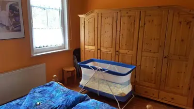 Ein Bett oder Betten in einem Zimmer der Unterkunft Ferienwohnung Schulze-Falck