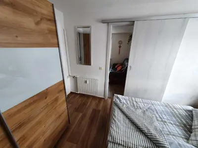 Ein Bett oder Betten in einem Zimmer der Unterkunft Ferienwohnung Schenk