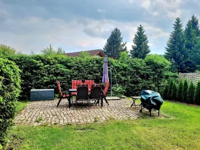 Ein Garten an der Unterkunft Haus 