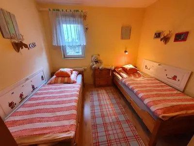 Ein Bett oder Betten in einem Zimmer der Unterkunft Haus Irina & Haus Anna