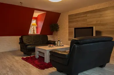 Ein Sitzbereich in der Unterkunft Apartment Alma