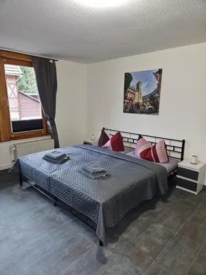 Ein Bett oder Betten in einem Zimmer der Unterkunft Mittel-Schänke Wieda