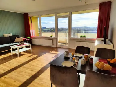Ein Sitzbereich in der Unterkunft Apartment Harzfeuer mit wunderbarem Ausblick und Schwimmbad