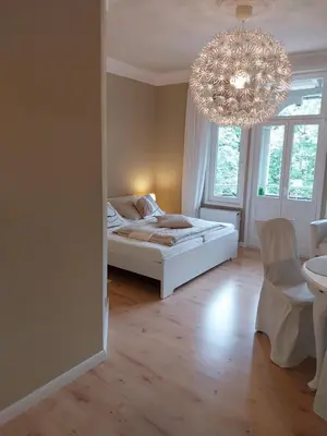 Ein Bett oder Betten in einem Zimmer der Unterkunft Ferienwohnung Benvenuto