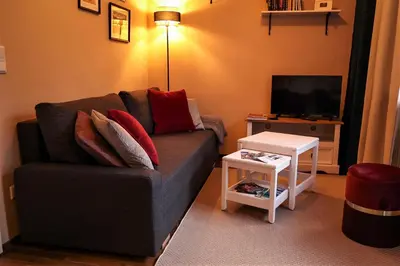 Ein Sitzbereich in der Unterkunft Apartment Serenade am Zwinger