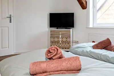 Ein Bett oder Betten in einem Zimmer der Unterkunft Hotel Alte Färberei