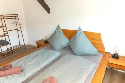 Ein Bett oder Betten in einem Zimmer der Unterkunft Hotel Alte Färberei