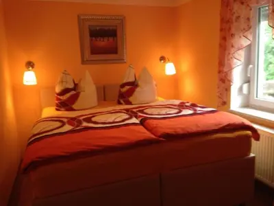 Ein Bett oder Betten in einem Zimmer der Unterkunft Ferienhaus 2