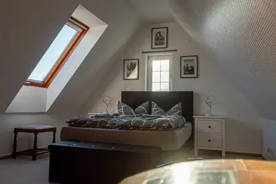 Ein Bett oder Betten in einem Zimmer der Unterkunft KIosterlinchen